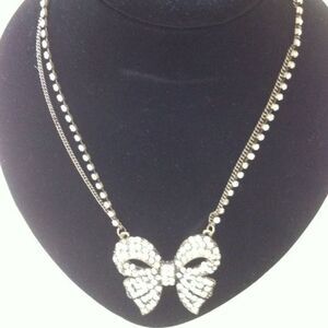 Antique gold tone Bow necklace